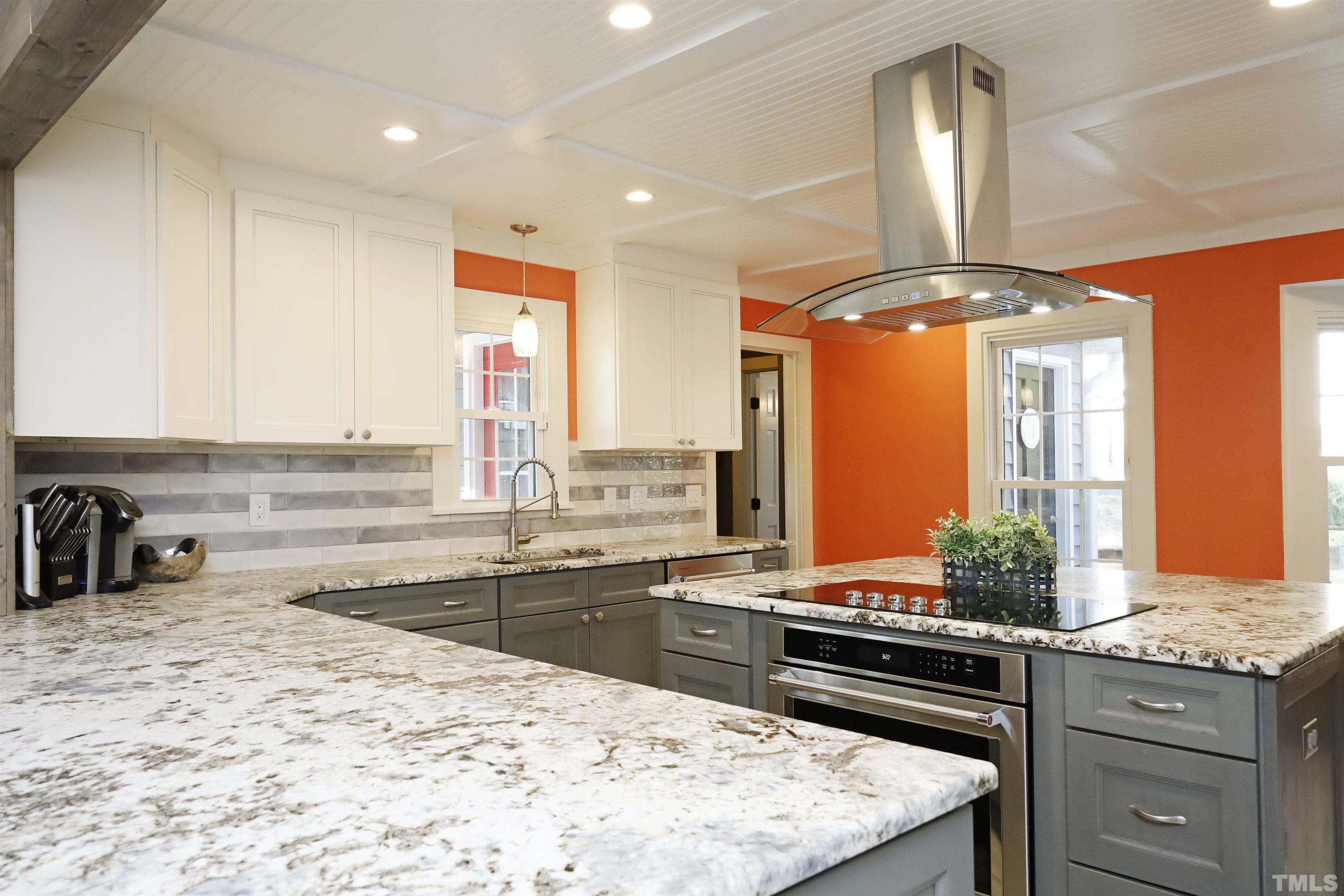 5308 Country Trail Raleigh, NC 27613 - Photo 15 of 51 a kitchen with sink refrigerator and stove