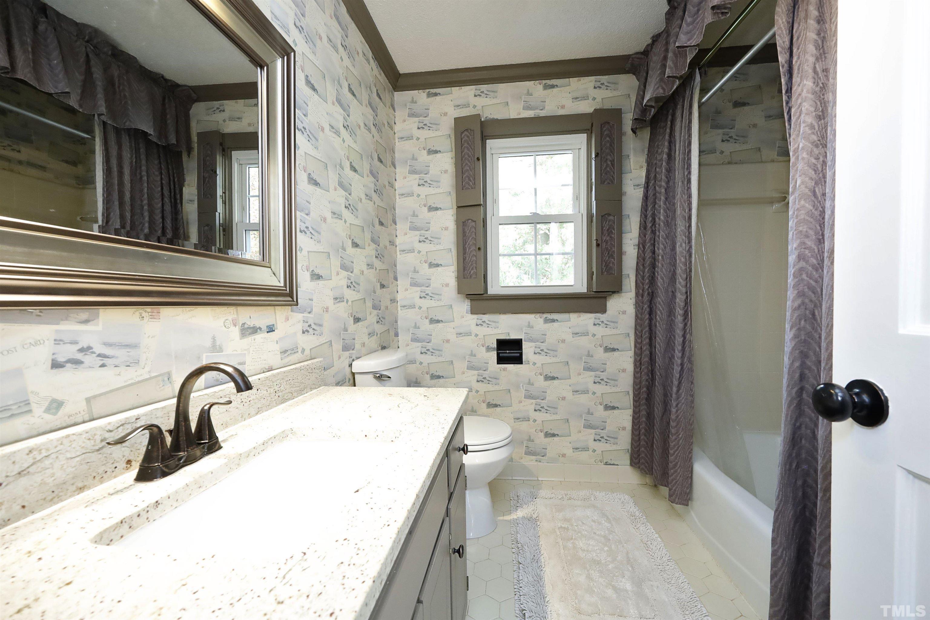5308 Country Trail Raleigh, NC 27613 - Photo 36 of 51 a bathroom with a sink and a bathtub