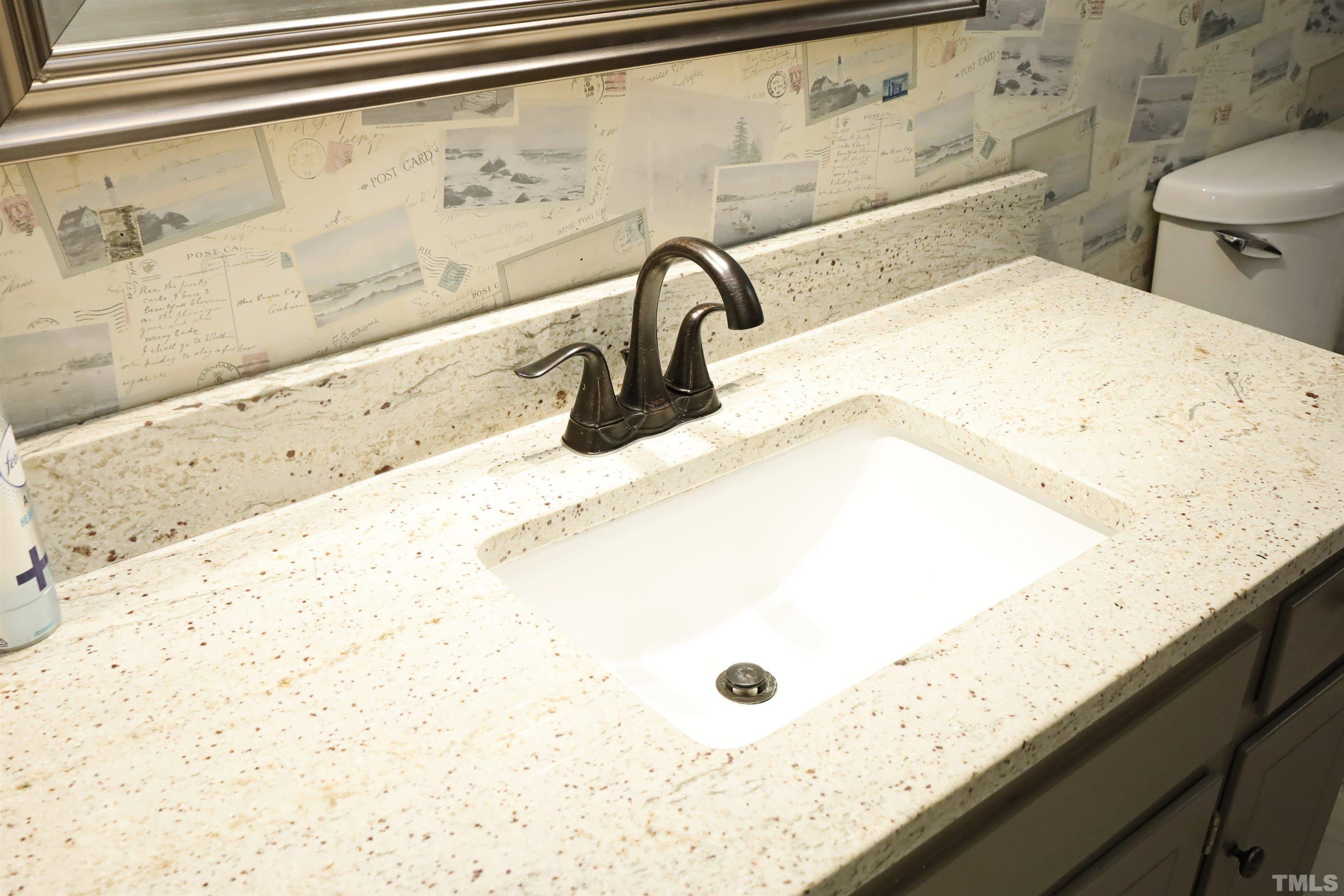 5308 Country Trail Raleigh, NC 27613 - Photo 37 of 51 a bathroom with a granite countertop sink a toilet and a bathtub
