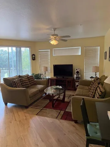 a living room with furniture fireplace and a fireplace