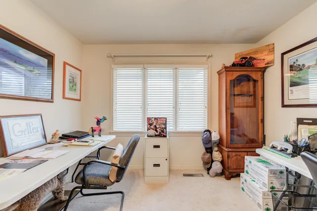 a room with furniture and a window