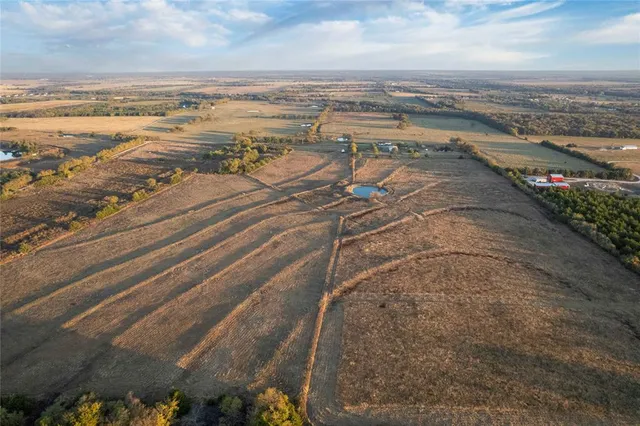 a view of a lake from a yard