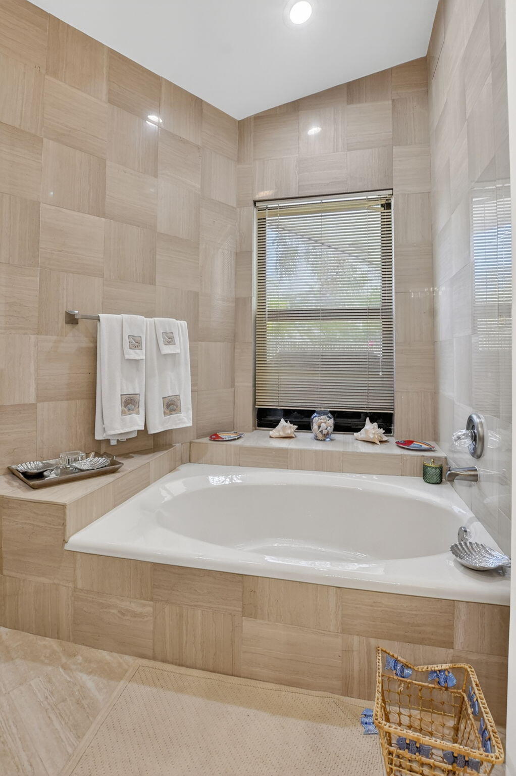 22519 Esplanada Circle, Unit W Boca Raton, FL 33433 - Photo 35 of 57 a bathroom with a tub sink and mirror