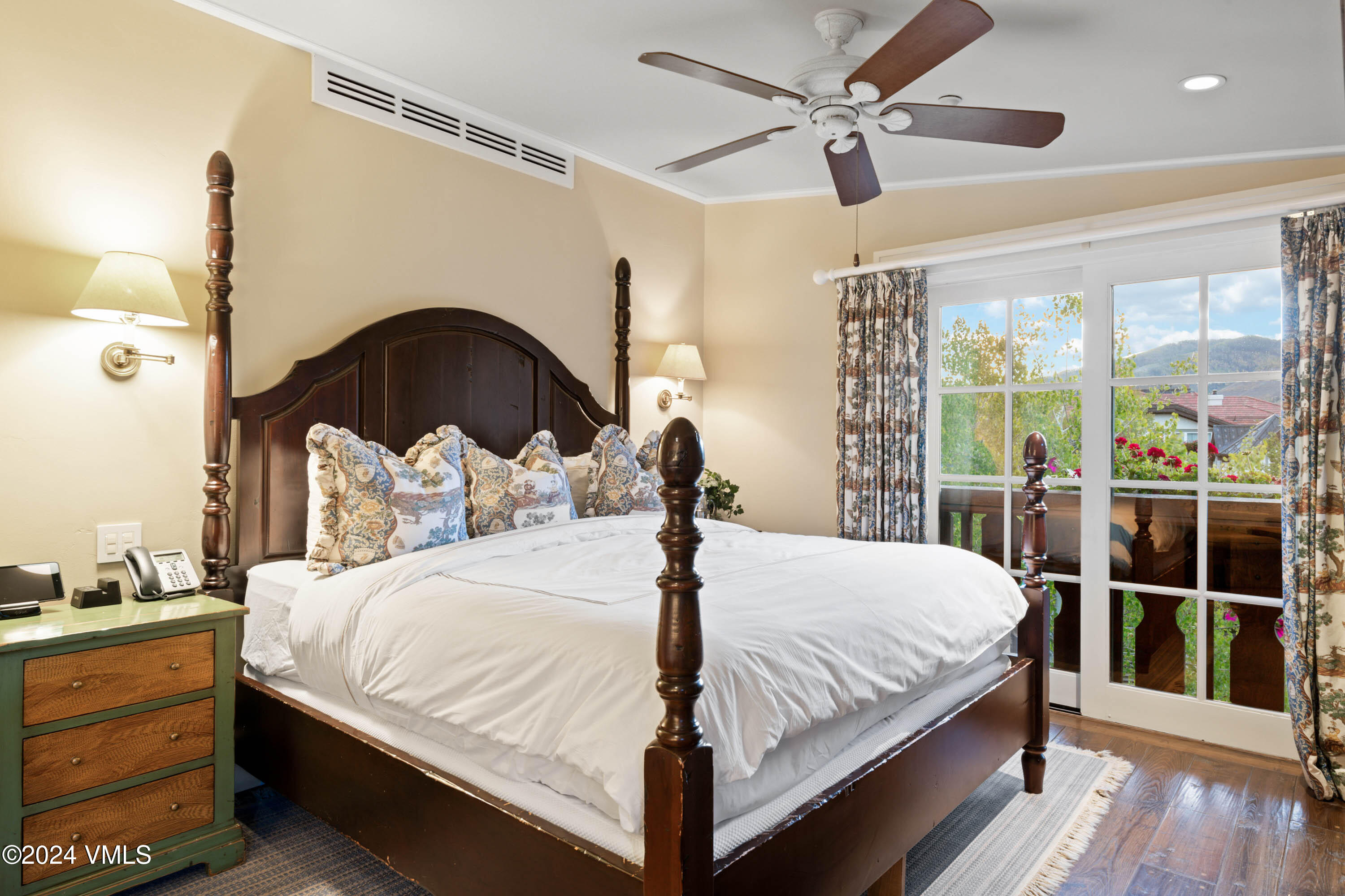 1 Willow Bridge Road, Unit 31 Vail, CO 81657 - Photo 12 of 39 a large bed sitting in a bedroom next to a window