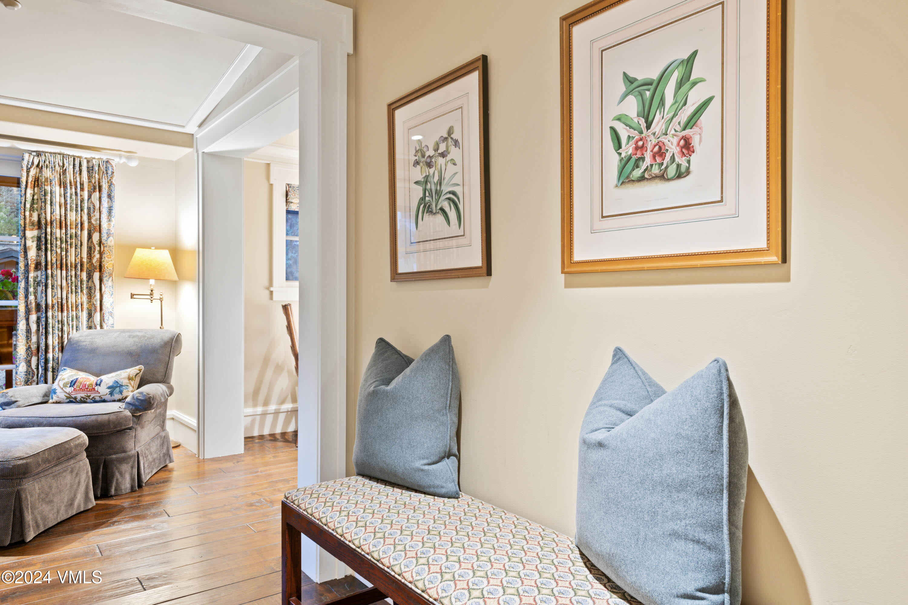 1 Willow Bridge Road, Unit 31 Vail, CO 81657 - Photo 16 of 39 a living room with furniture and wooden floor