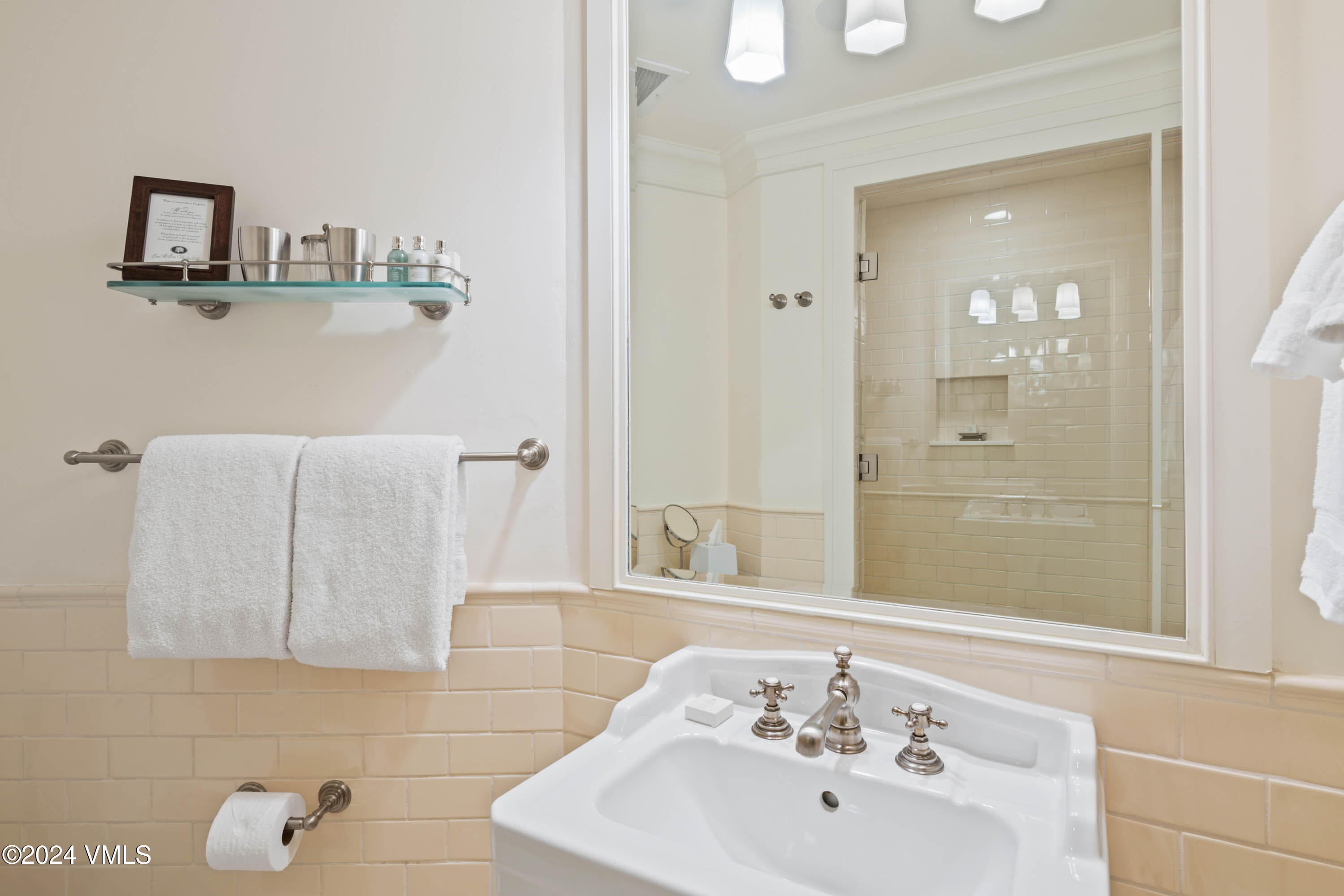 1 Willow Bridge Road, Unit 31 Vail, CO 81657 - Photo 22 of 39 a bathroom with a sink and a mirror
