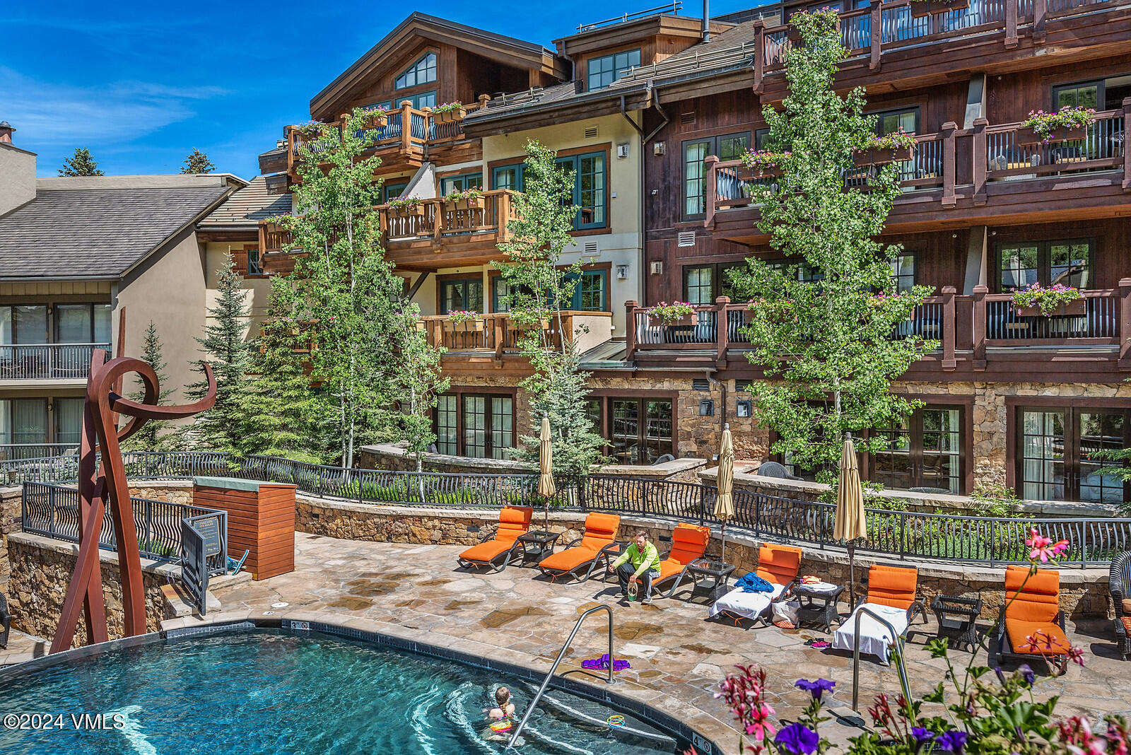 1 Willow Bridge Road, Unit 31 Vail, CO 81657 - Photo 26 of 39 front view of a house with a yard