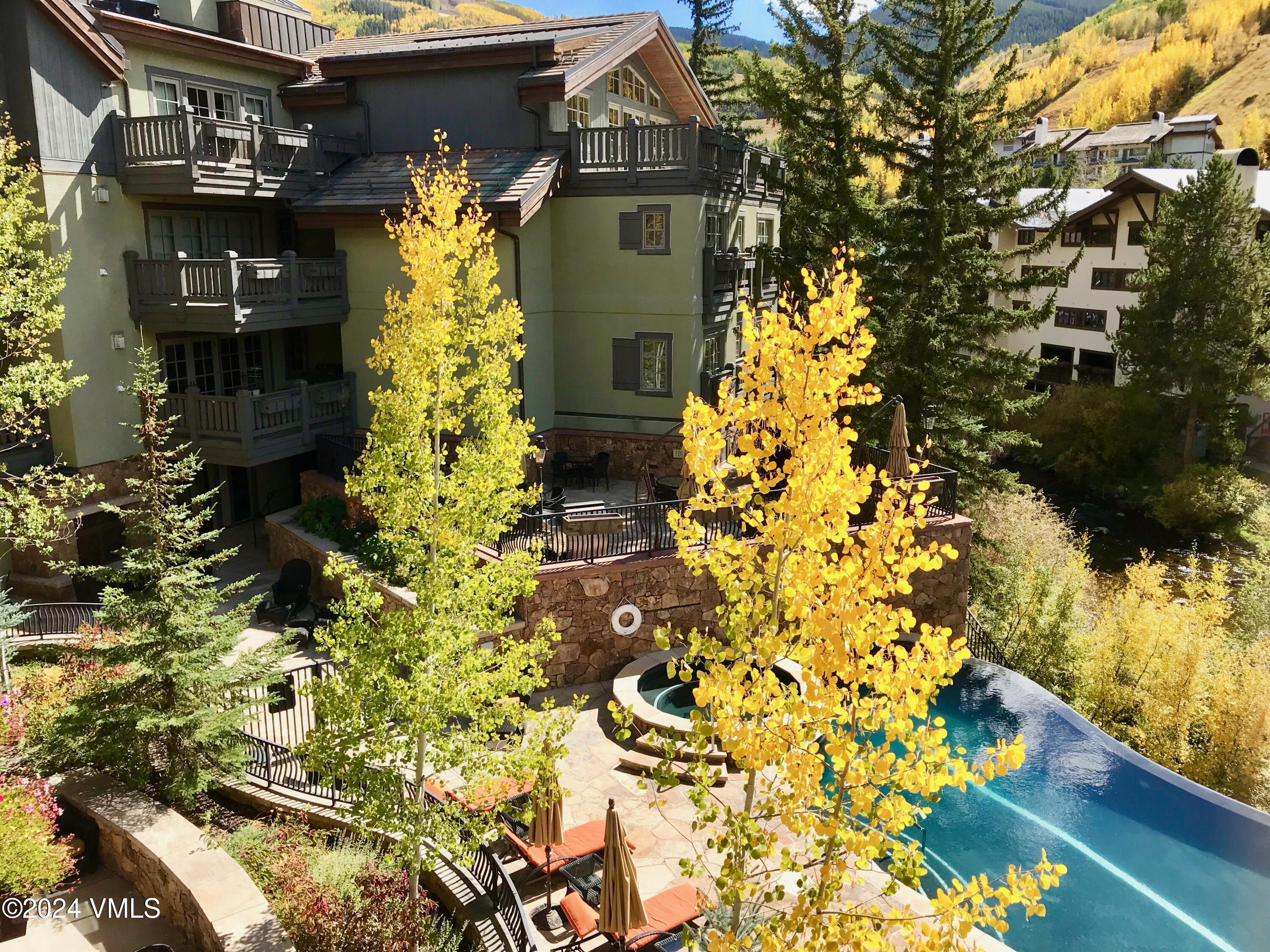 1 Willow Bridge Road, Unit 31 Vail, CO 81657 - Photo 30 of 39 a view of a house with a yard
