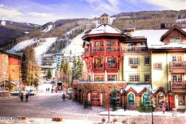 1 Willow Bridge Road, Unit 31 Vail, CO 81657 - Photo 39 of 39 a front view of a building with streets and trees