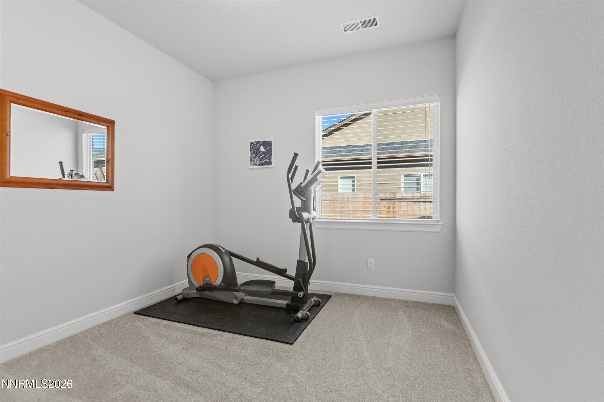 11125 Gallaudet Drive Reno, NV 89506 - Photo 22 of 32 a view of a room with gym equipment