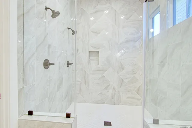 an entryway in a hall with a window