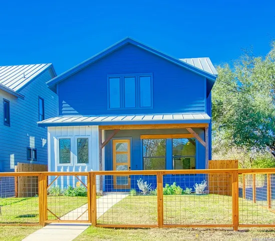 a view of a house with a swimming pool