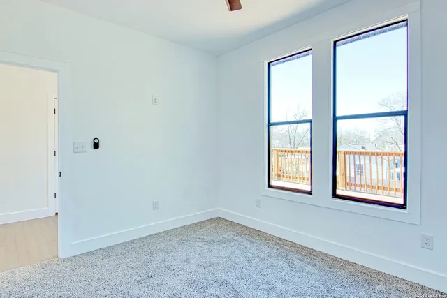 a view of a backyard with garden