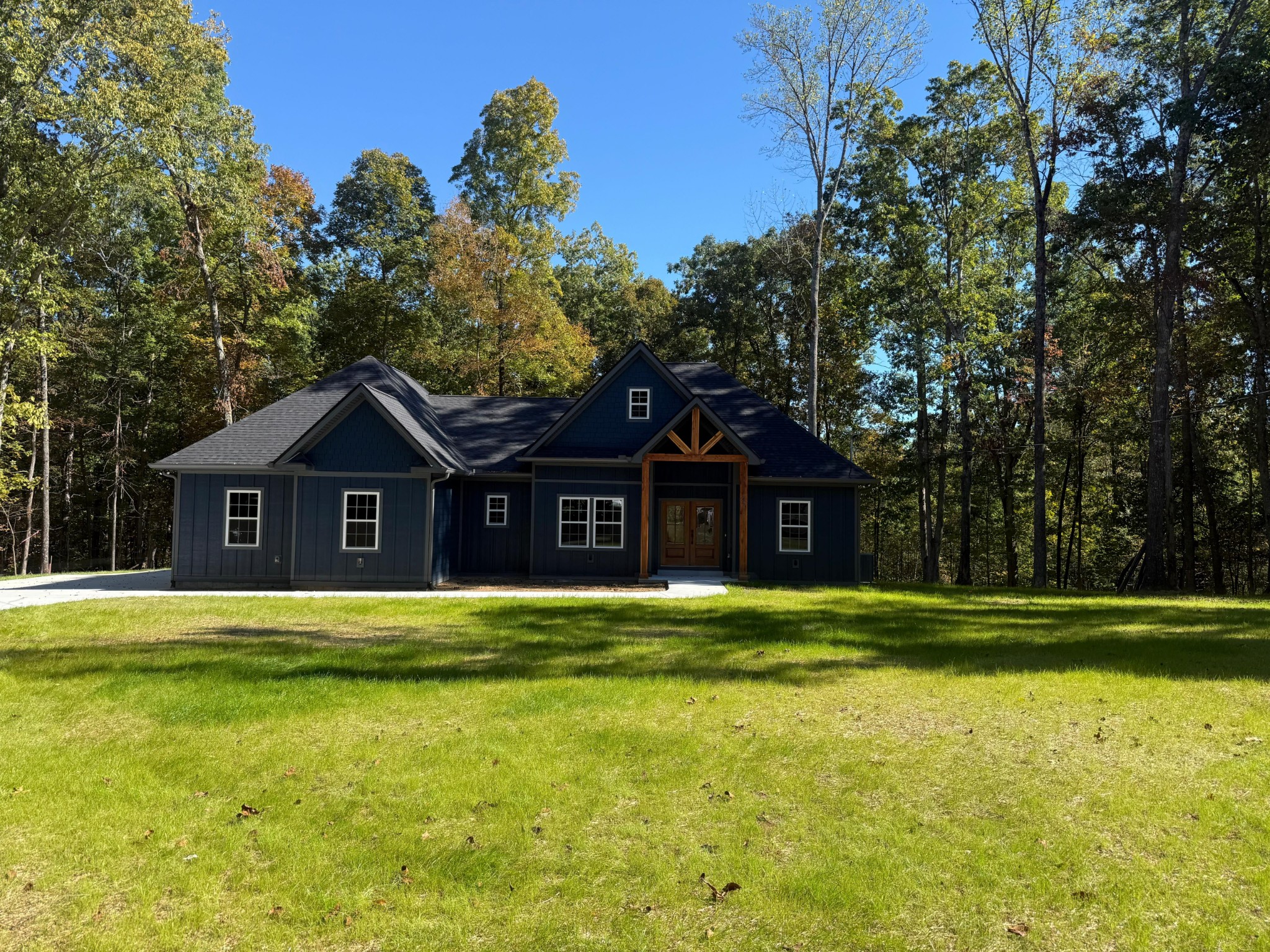 0 Sarvis Ridge Road Normandy, TN 37360 - Photo 8 of 22 a front view of a house with a yard and trees