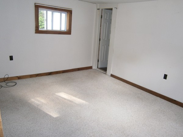 125 West Main Street Rindge, NH 03461 - Photo 14 of 19 an empty room with windows