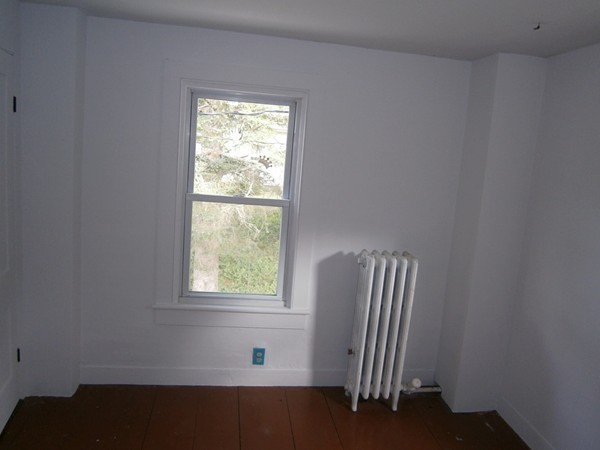 125 West Main Street Rindge, NH 03461 - Photo 15 of 19 a view of wooden floor and chair in a room
