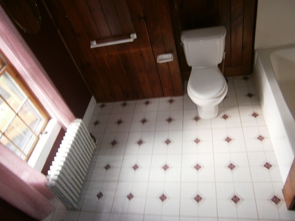 125 West Main Street Rindge, NH 03461 - Photo 17 of 19 a bathroom with a toilet sink and shower
