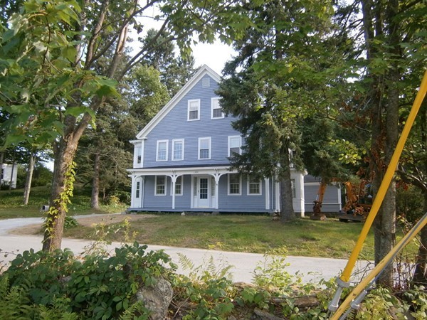 125 West Main Street Rindge, NH 03461 - Photo 2 of 19 a view of a house with pool and sitting area