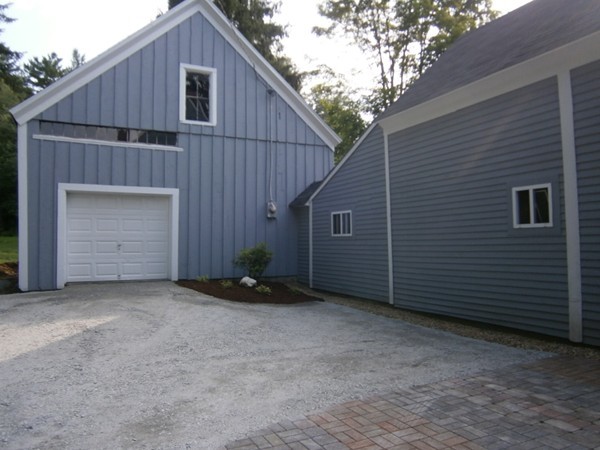 125 West Main Street Rindge, NH 03461 - Photo 4 of 19 a view of backyard of house