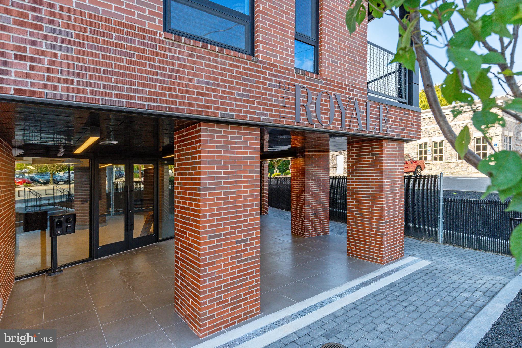 a view of a house with retail shops