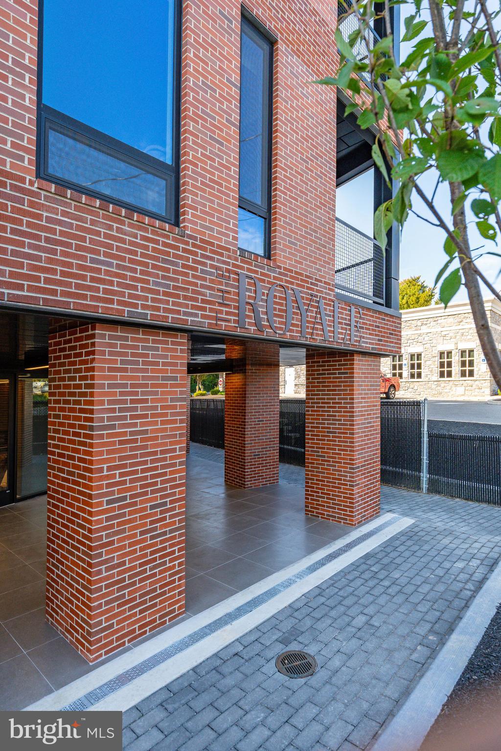 6910 Ridge Avenue, Unit 409 Philadelphia, PA 19128 - Photo 2 of 21 a front view of a house with garage