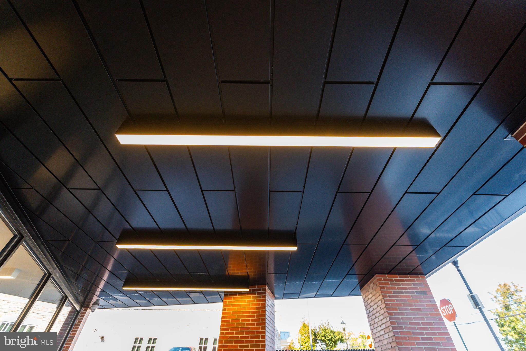 6910 Ridge Avenue, Unit 409 Philadelphia, PA 19128 - Photo 7 of 21 a view of an empty room with wooden floor
