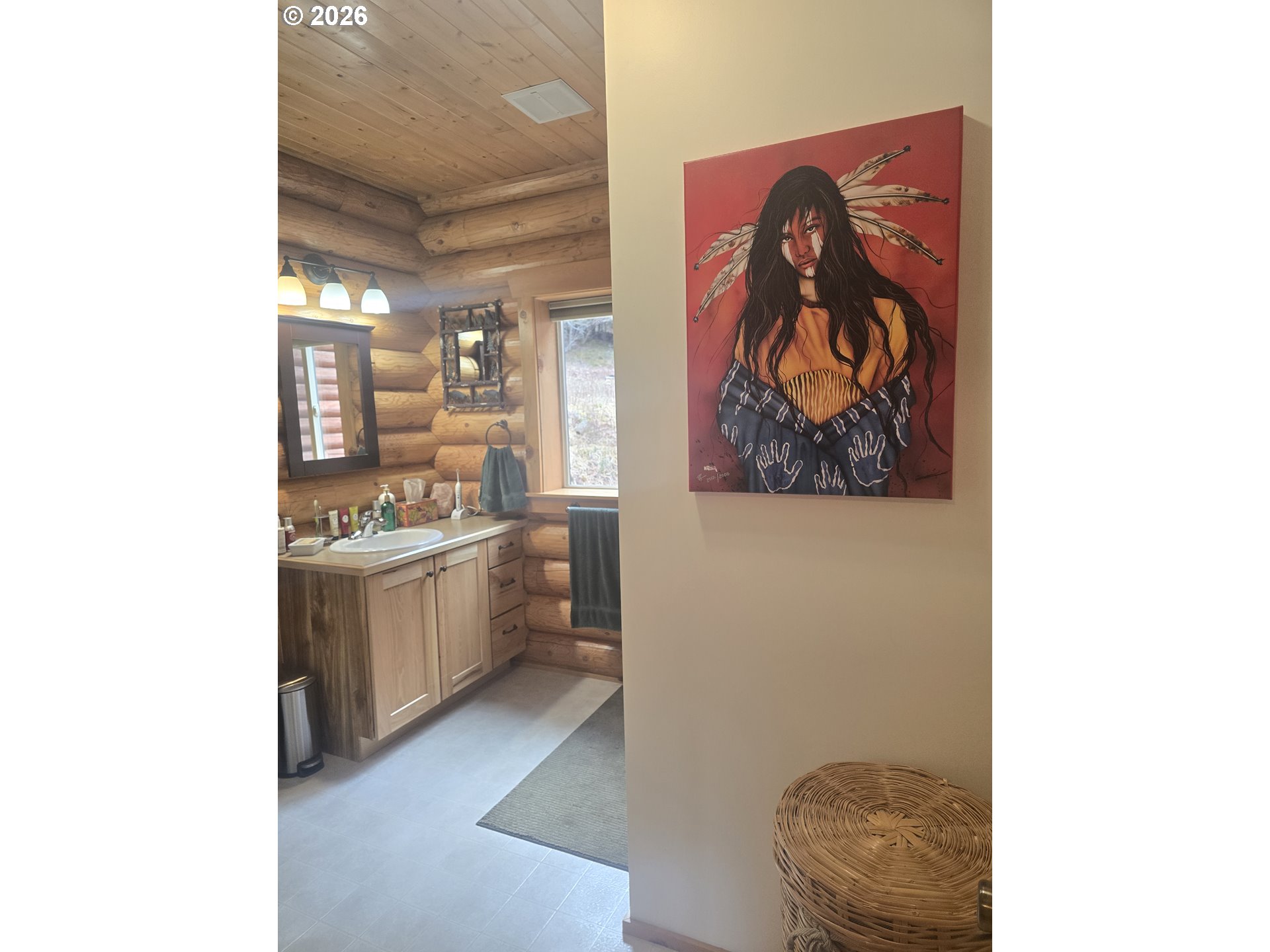 64276 Tamarack Road Lostine, OR 97857 - Photo 12 of 23 a large bathroom with a sink and a mirror