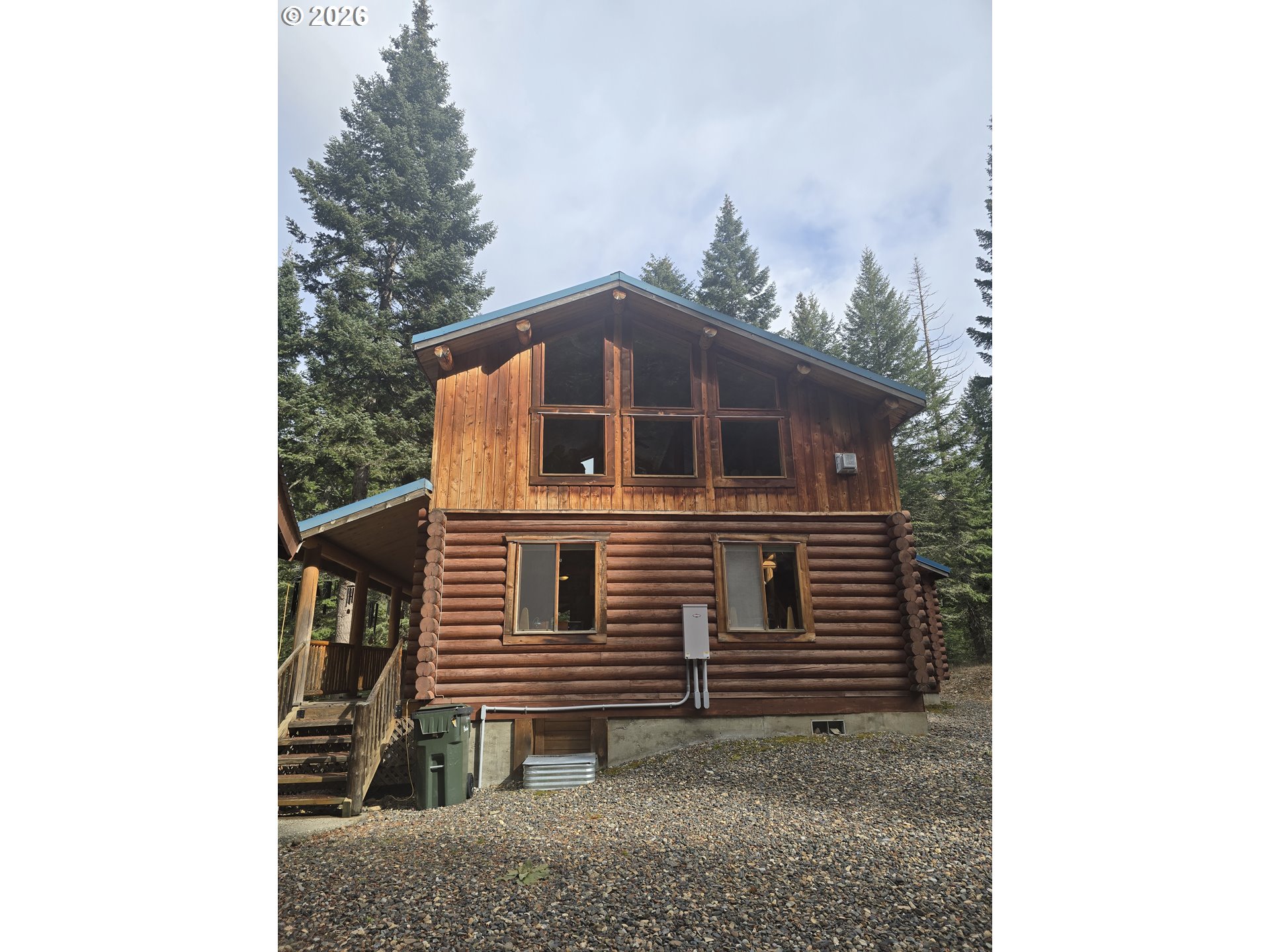 64276 Tamarack Road Lostine, OR 97857 - Photo 14 of 23 a view of a house with a yard