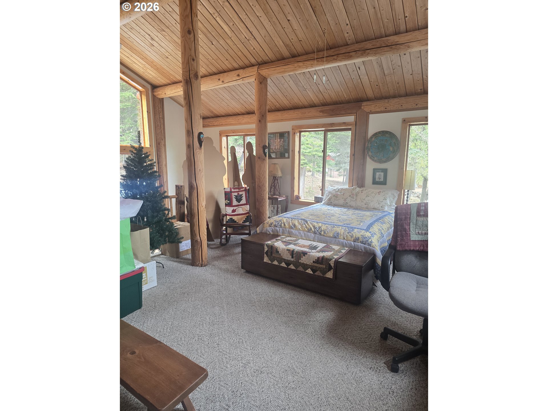 64276 Tamarack Road Lostine, OR 97857 - Photo 15 of 23 a bedroom with a bed and a window
