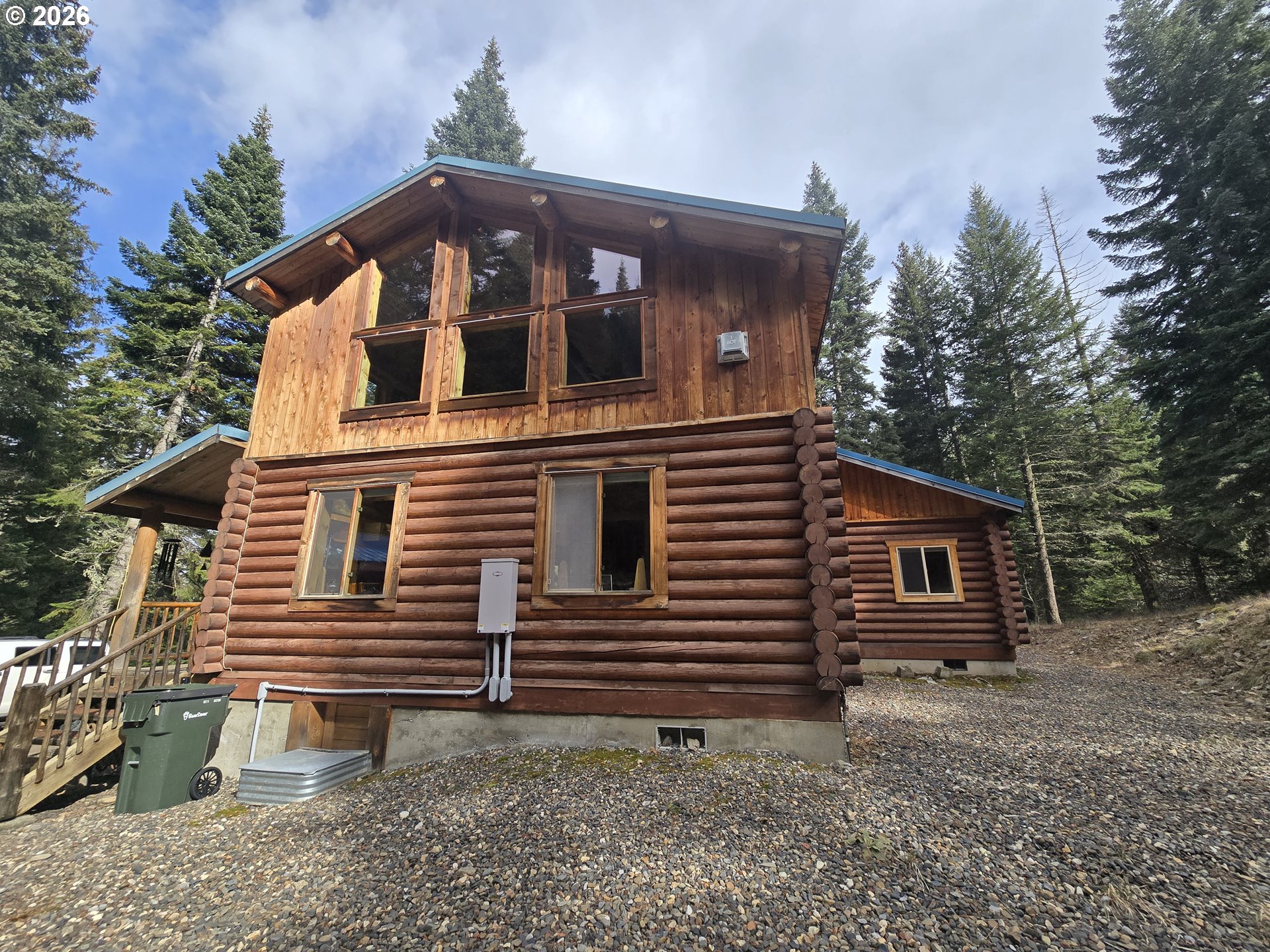 64276 Tamarack Road Lostine, OR 97857 - Photo 2 of 23 a front view of a house with stairs