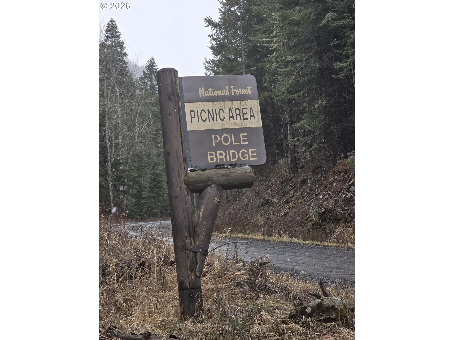 64276 Tamarack Road Lostine, OR 97857 - Photo 21 of 23 a sign board with a tree