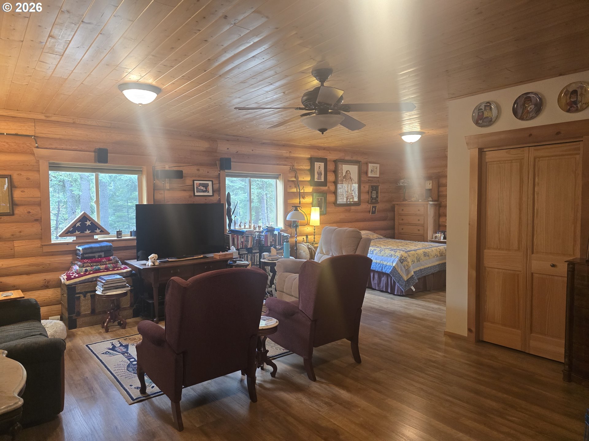 64276 Tamarack Road Lostine, OR 97857 - Photo 7 of 23 a view of a livingroom with furniture window and wooden floor