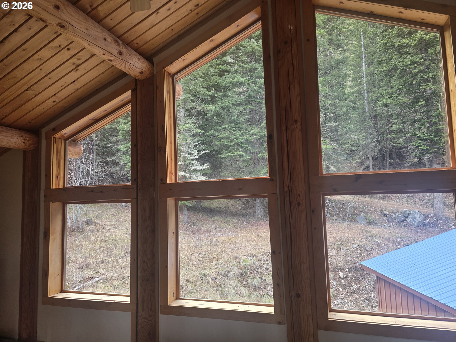 64276 Tamarack Road Lostine, OR 97857 - Photo 10 of 23 a view of a room that has a large window