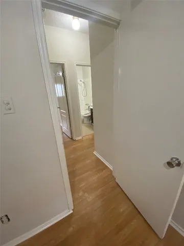 a view of a livingroom from a hallway