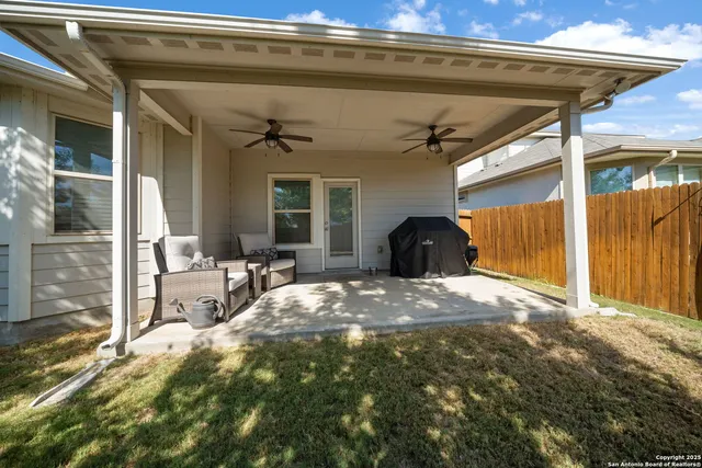 a view of a backyard of a house