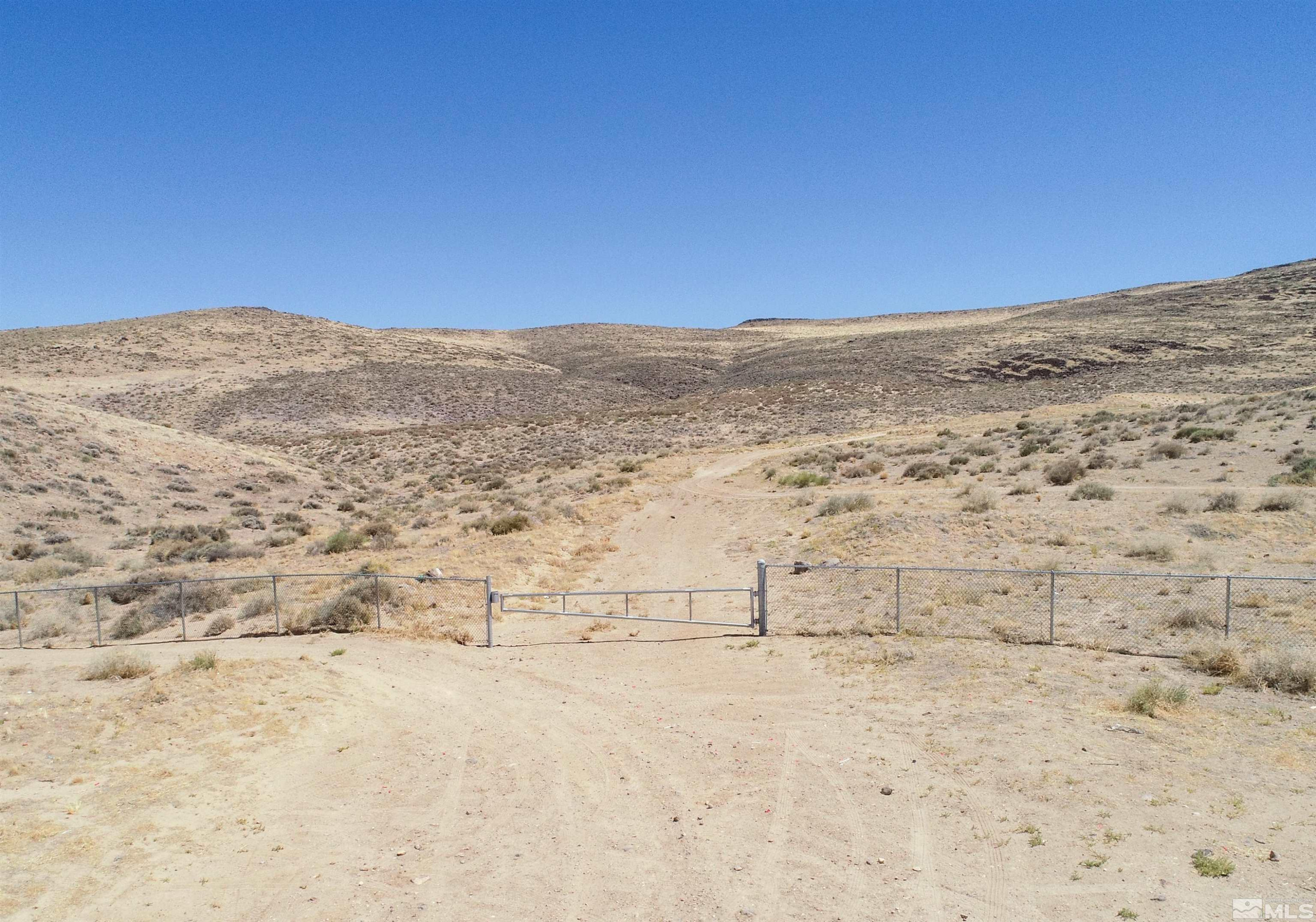 1000 Micro Way Silver Springs, NV 89429 - Photo 3 of 15 a view of ocean and a mountain