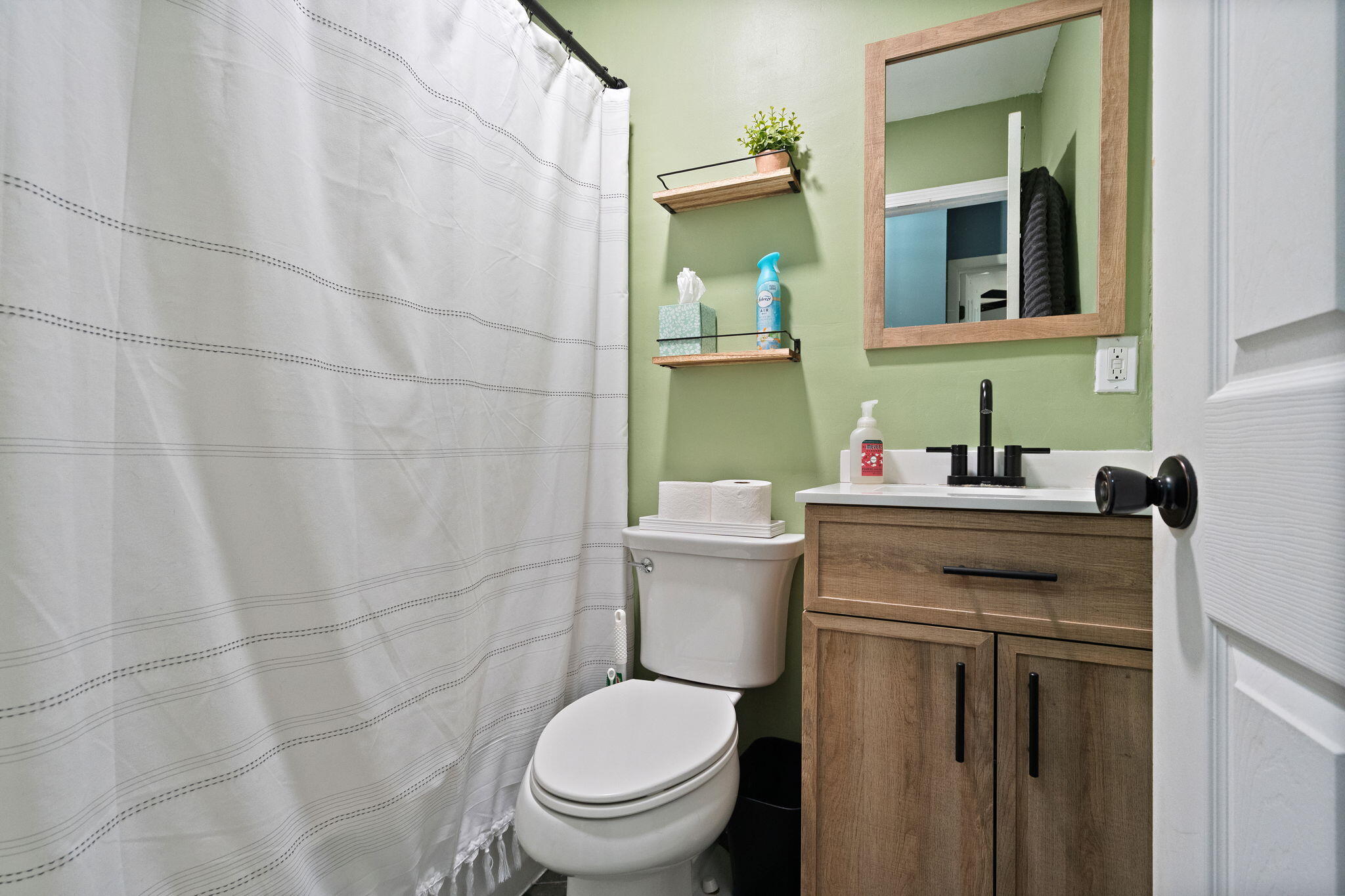 725 Juniper Road Valparaiso, IN 46385 - Photo 14 of 21 a bathroom with a sink toilet and mirror