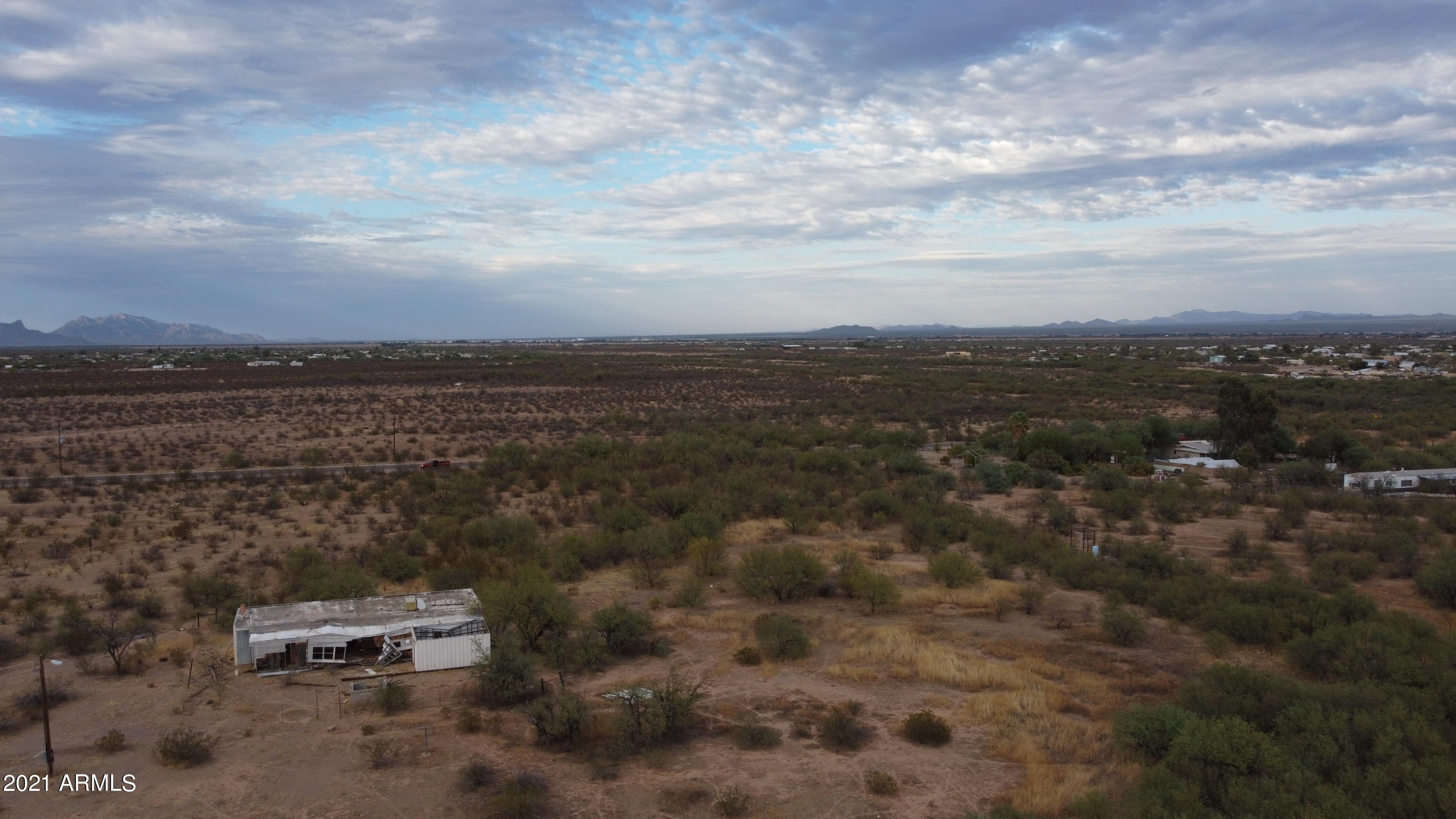 12380 North Pars Ranch Place, Unit 1 Marana, AZ 85653 - Photo 33 of 38 a view of a city with mountain