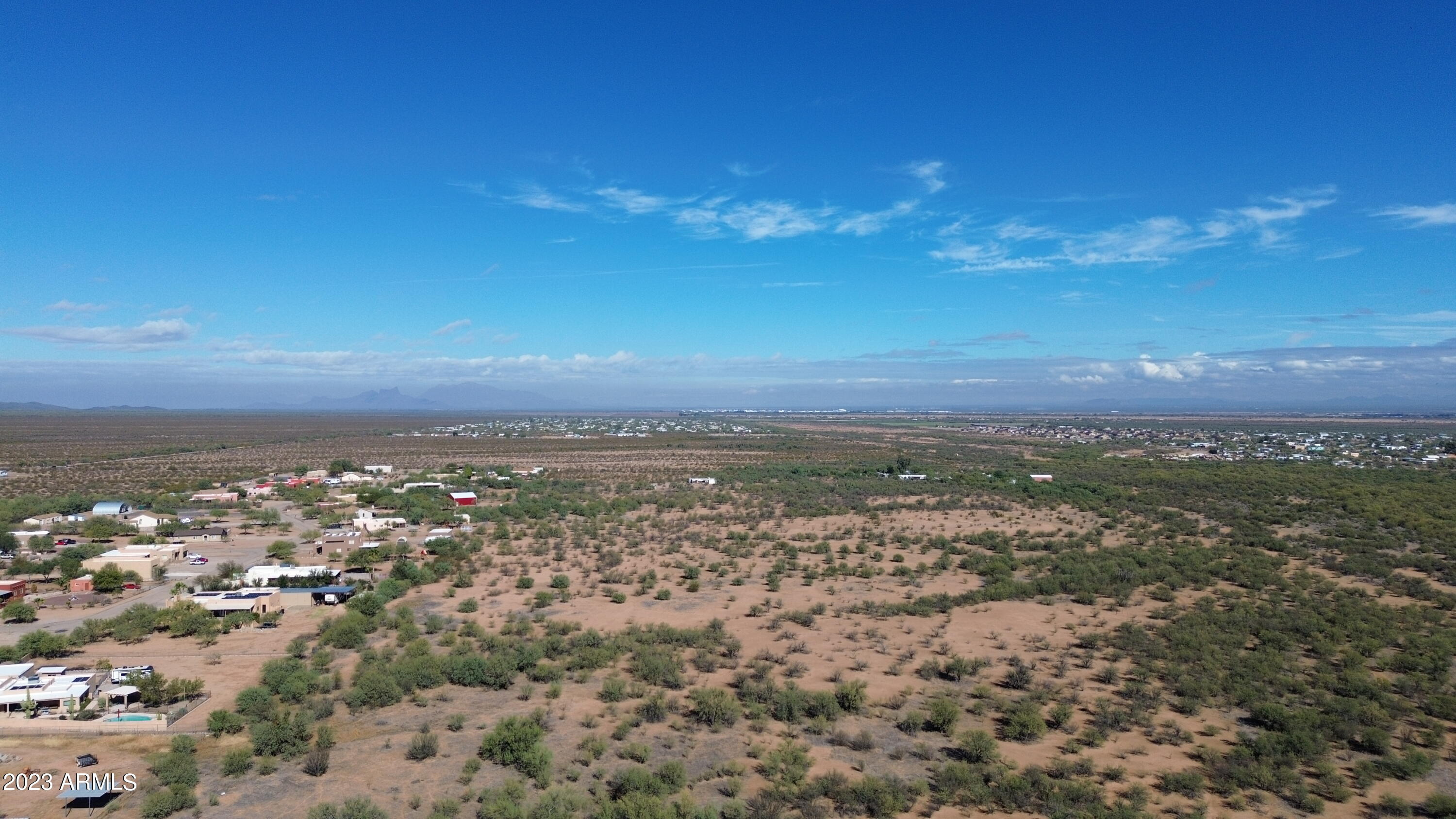 12380 North Pars Ranch Place, Unit 1 Marana, AZ 85653 - Photo 9 of 38 an aerial view of residential houses with city view