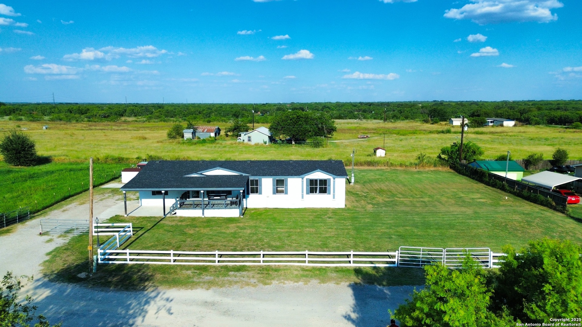 a view of a lake with a big yard