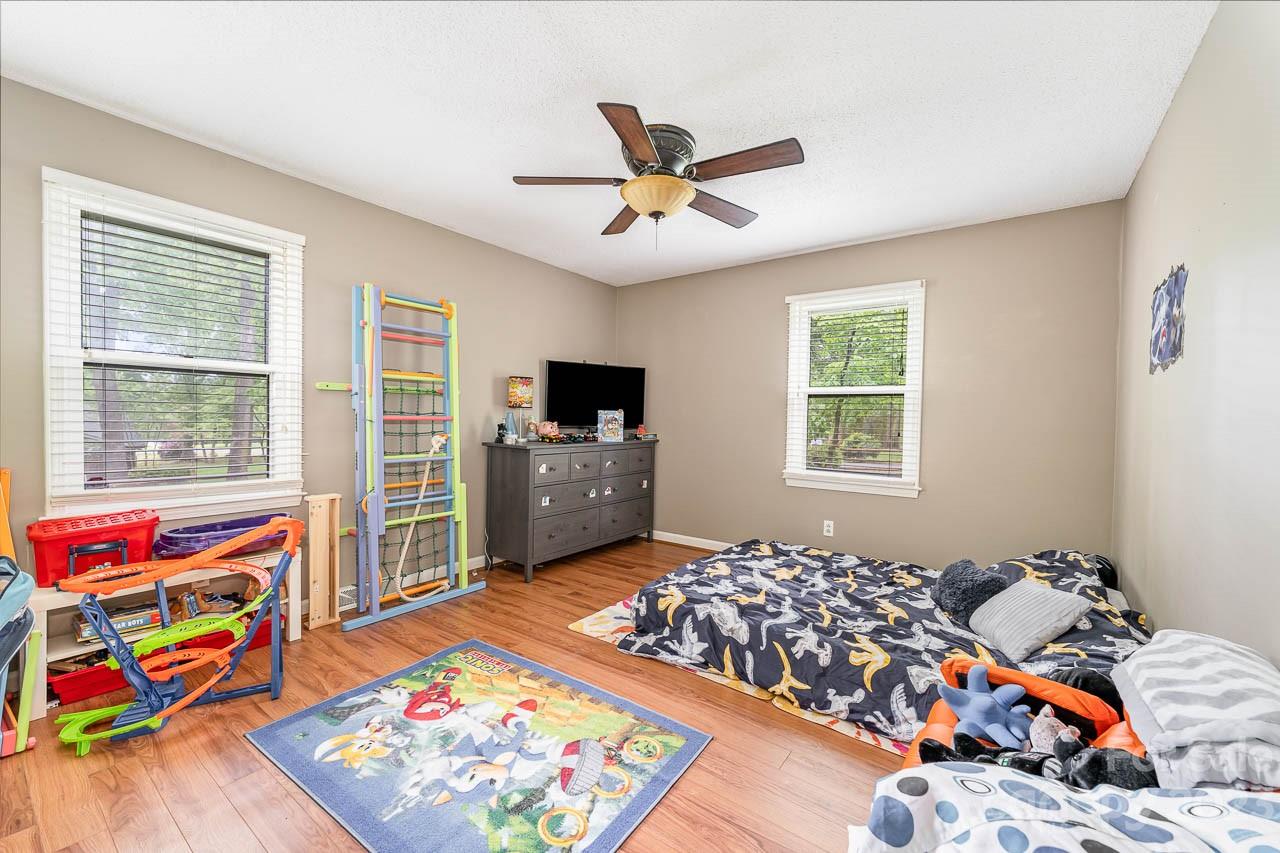 240 Hidden Hut Road Salisbury, NC 28147 - Photo 26 of 32 a bedroom with furniture and a window
