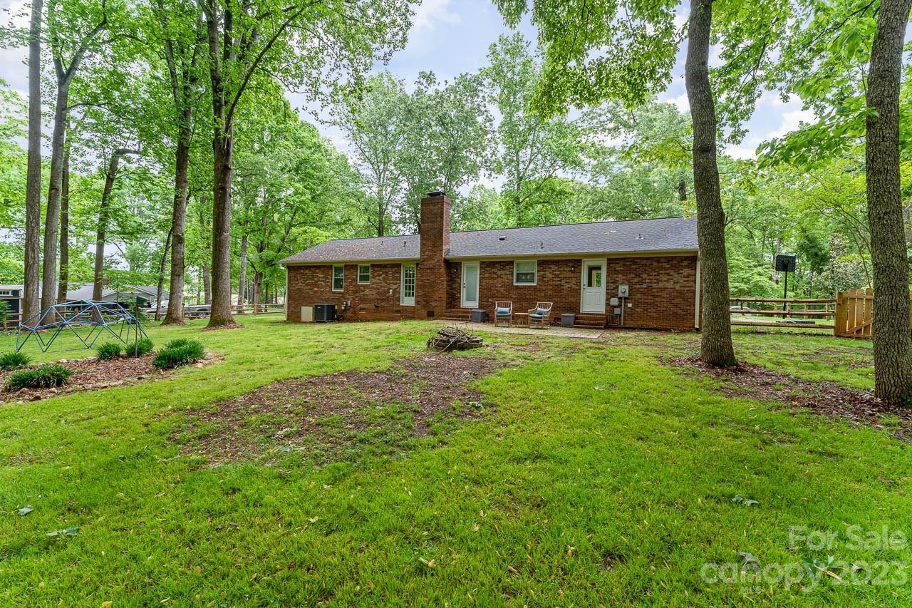 240 Hidden Hut Road Salisbury, NC 28147 - Photo 30 of 32 front view of a house with a big yard