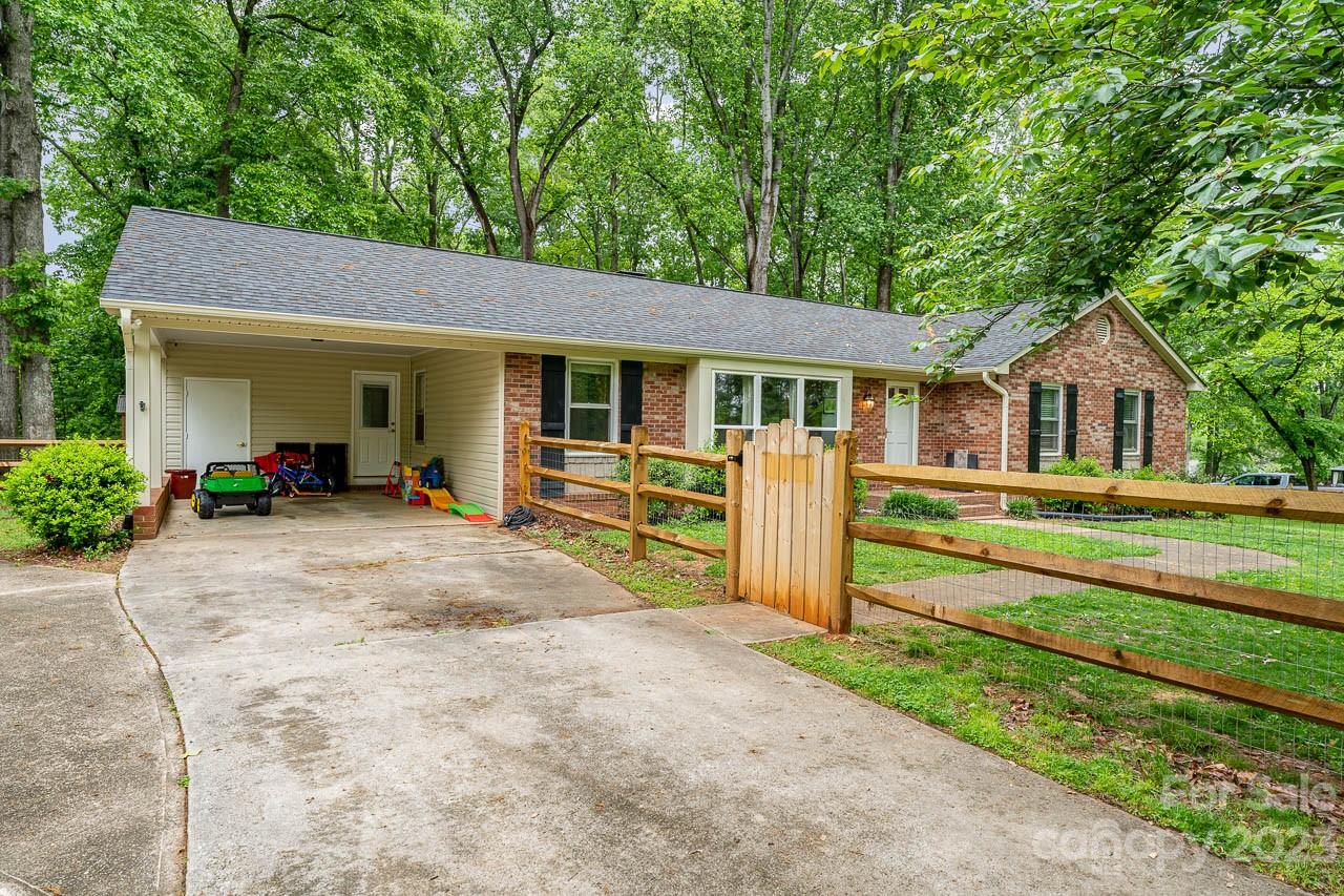 240 Hidden Hut Road Salisbury, NC 28147 - Photo 6 of 32 a front view of a house with a yard