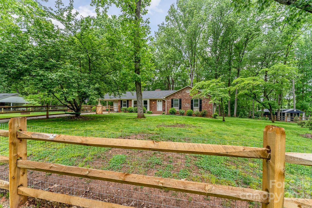 240 Hidden Hut Road Salisbury, NC 28147 - Photo 7 of 32 a view of a house with a yard
