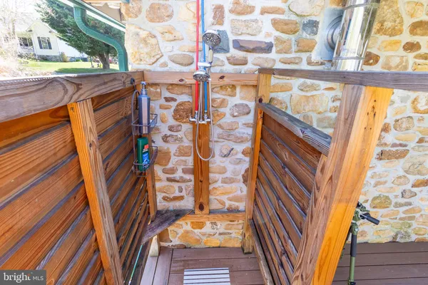 a view of front door with wooden floor