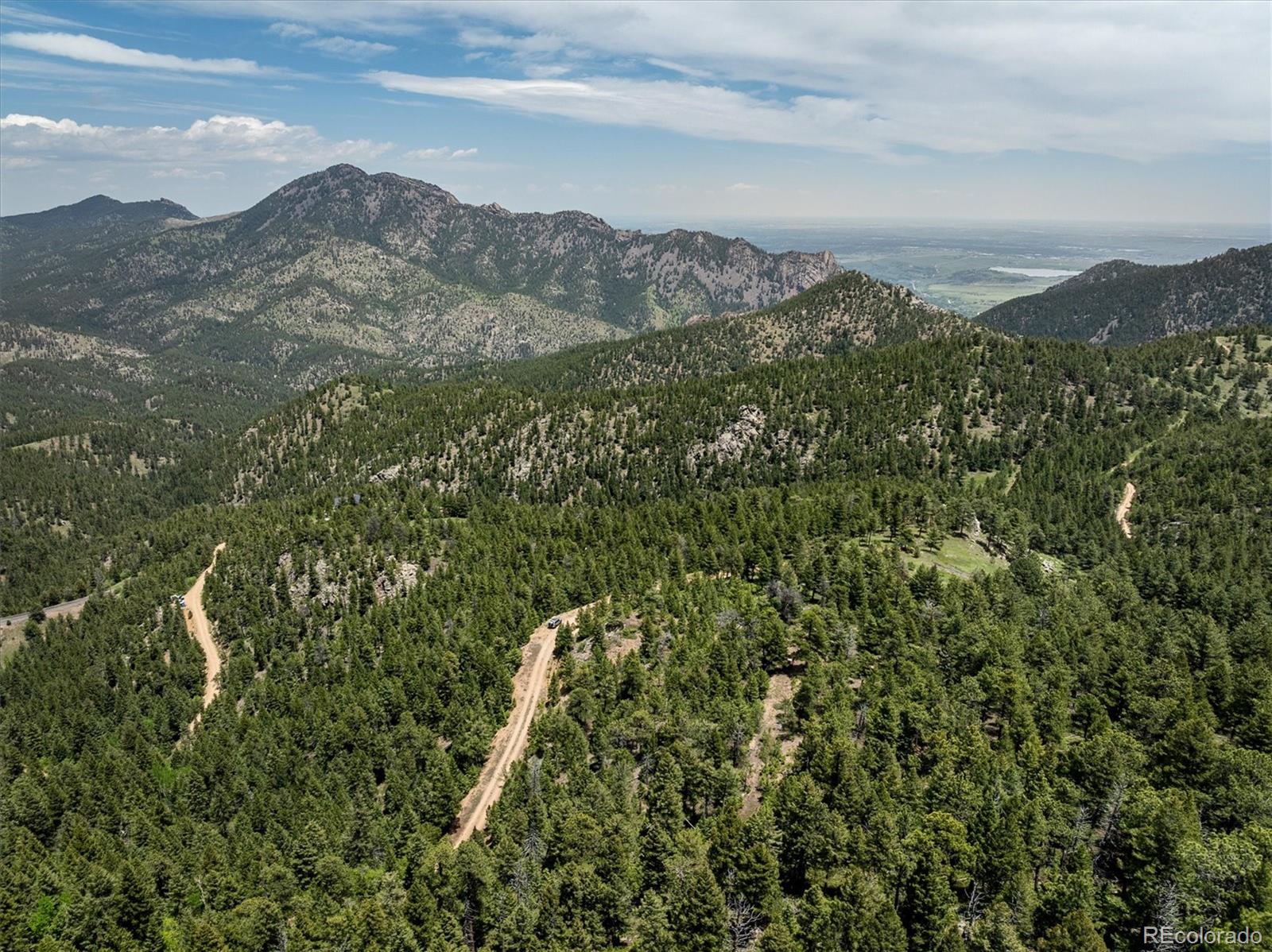1259 Chute Road Golden, CO 80403 - Photo 15 of 21 a view of a city with mountains