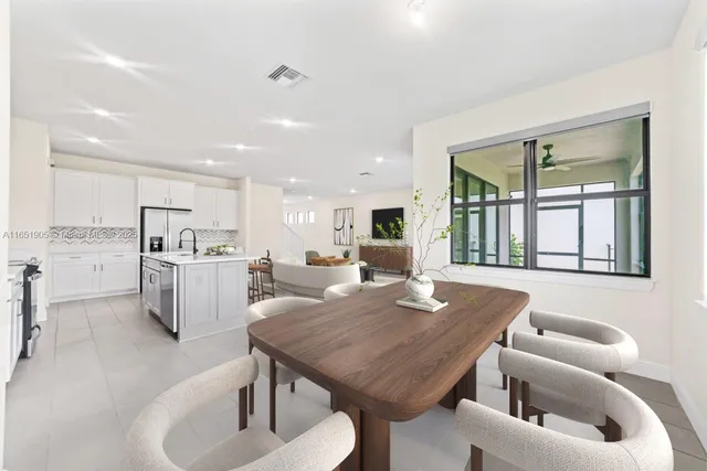 a view of kitchen with breakfast area
