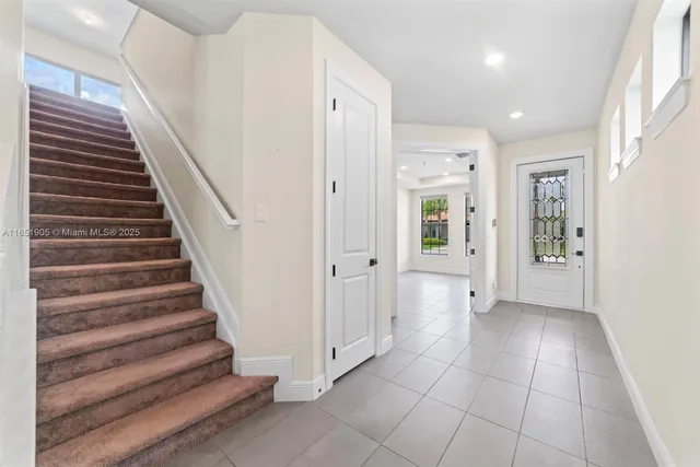 a view of an entryway with staircase
