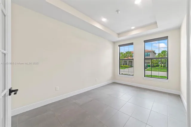 an empty room with windows