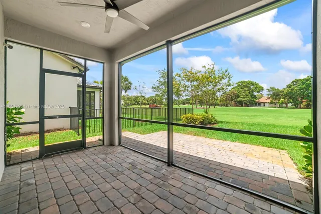 a view of a porch and garden